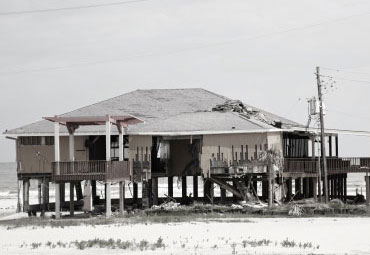 Wind damage - spray foam can help prevent uplift to Corona roofs